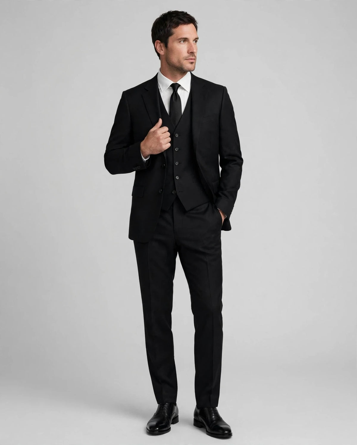 Black men's three-piece suit — model front view