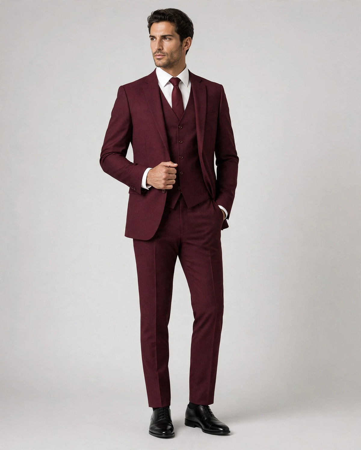 Burgundy men's three-piece suit — model front view