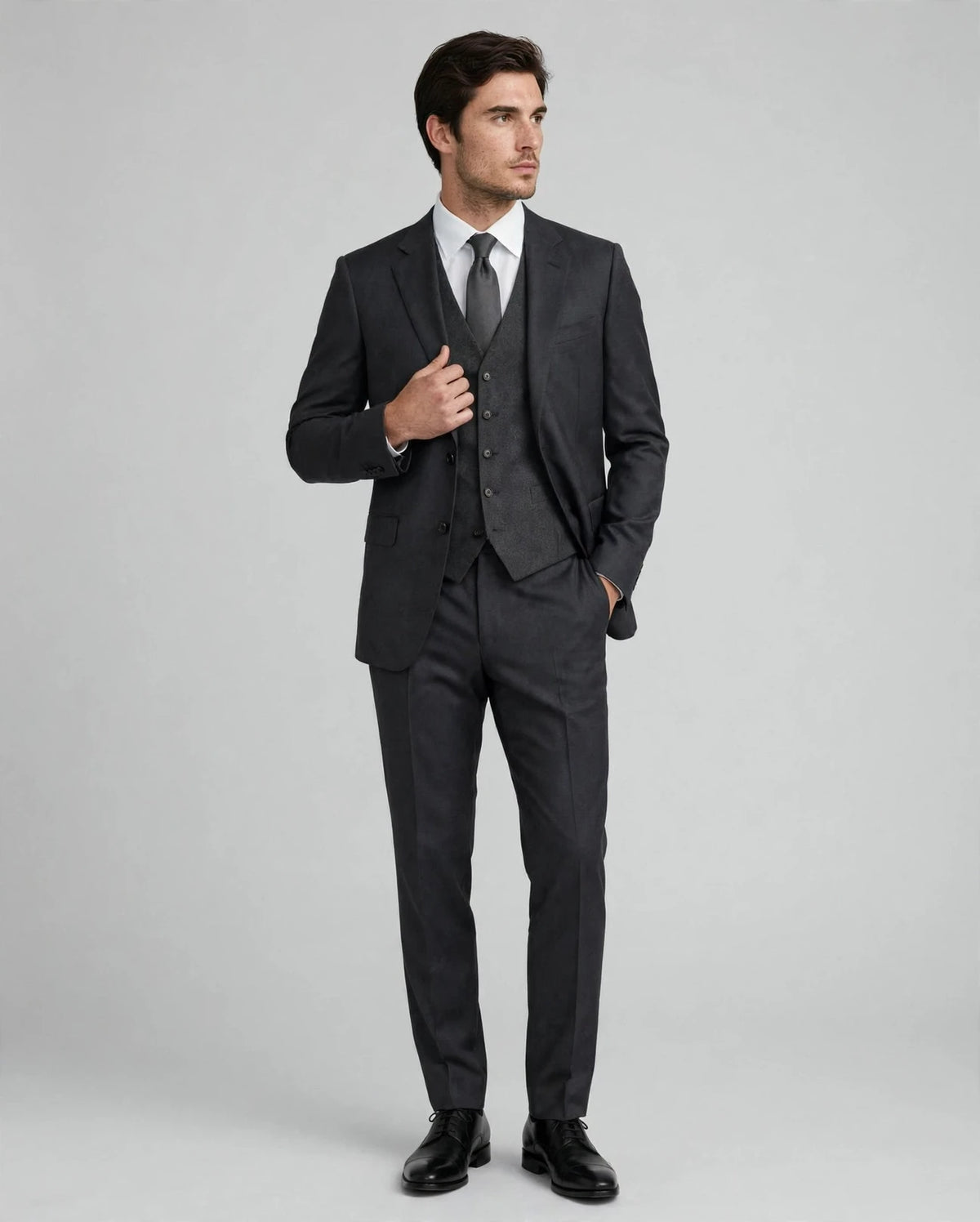 Charcoal Grey men's three-piece suit — model front view