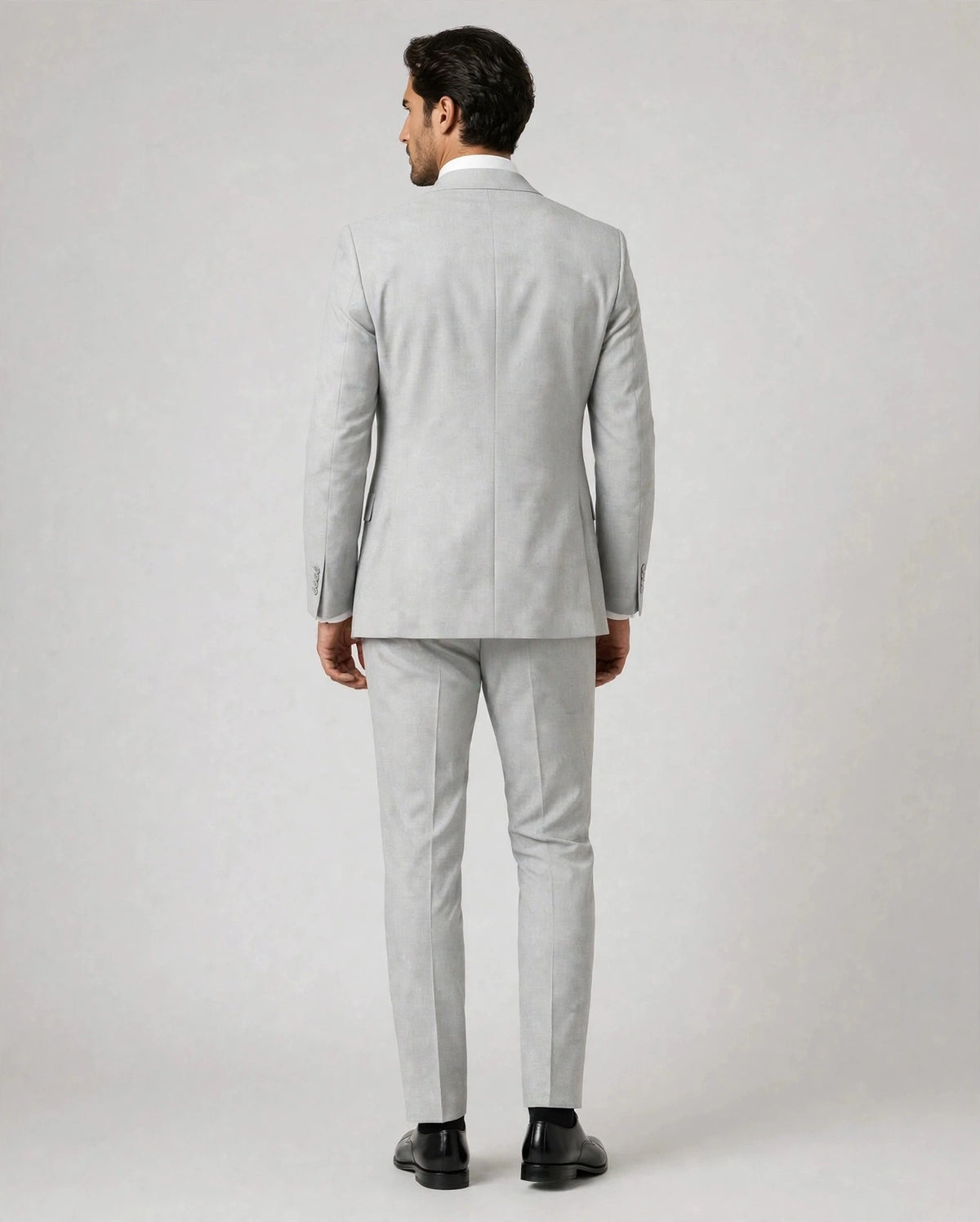 Light Grey men's three-piece suit — back view on model